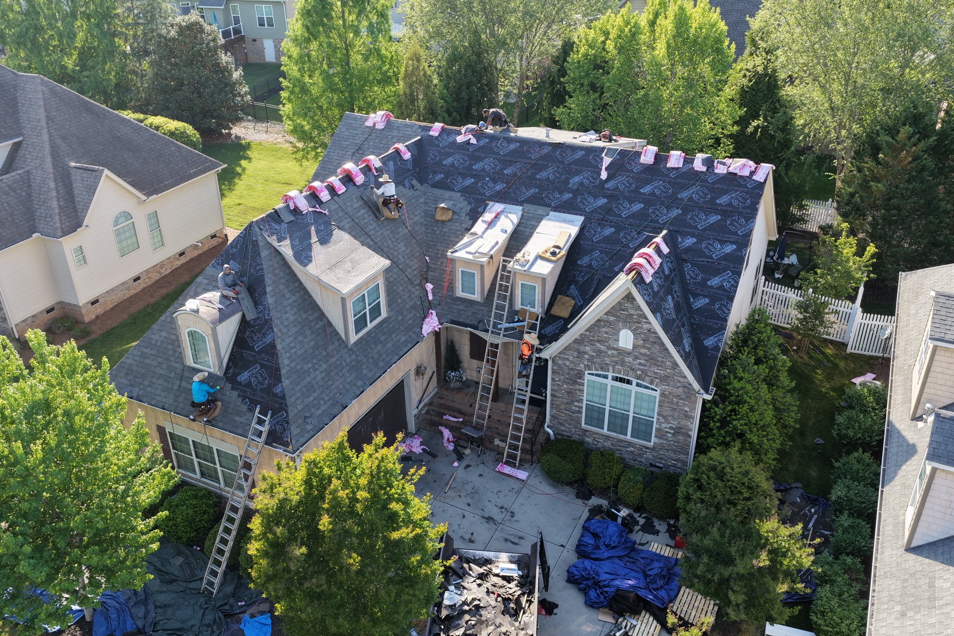 Exterior Genie crew installing a new roof on a Midlands SC home